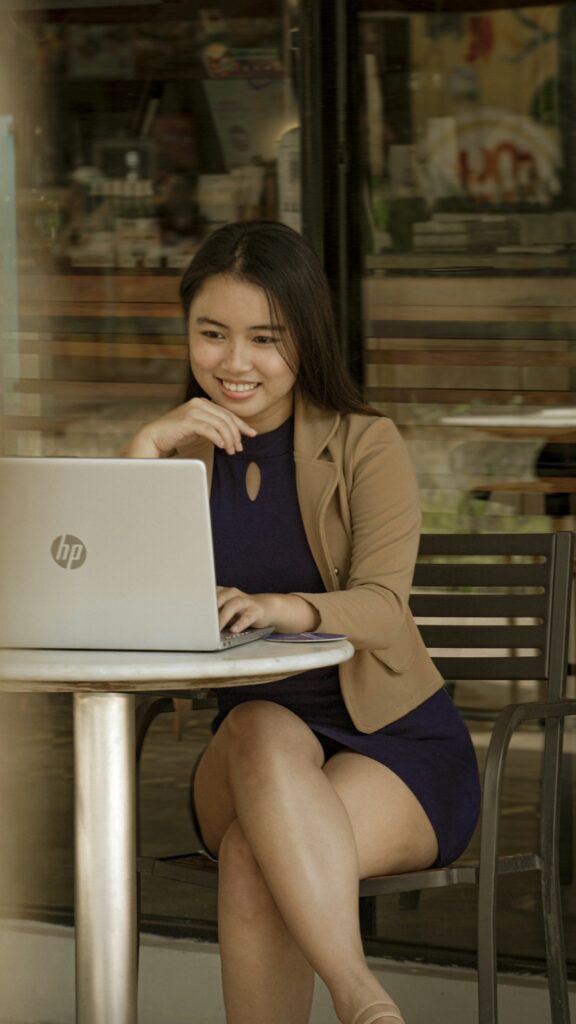 Smiling professional woman with laptop
